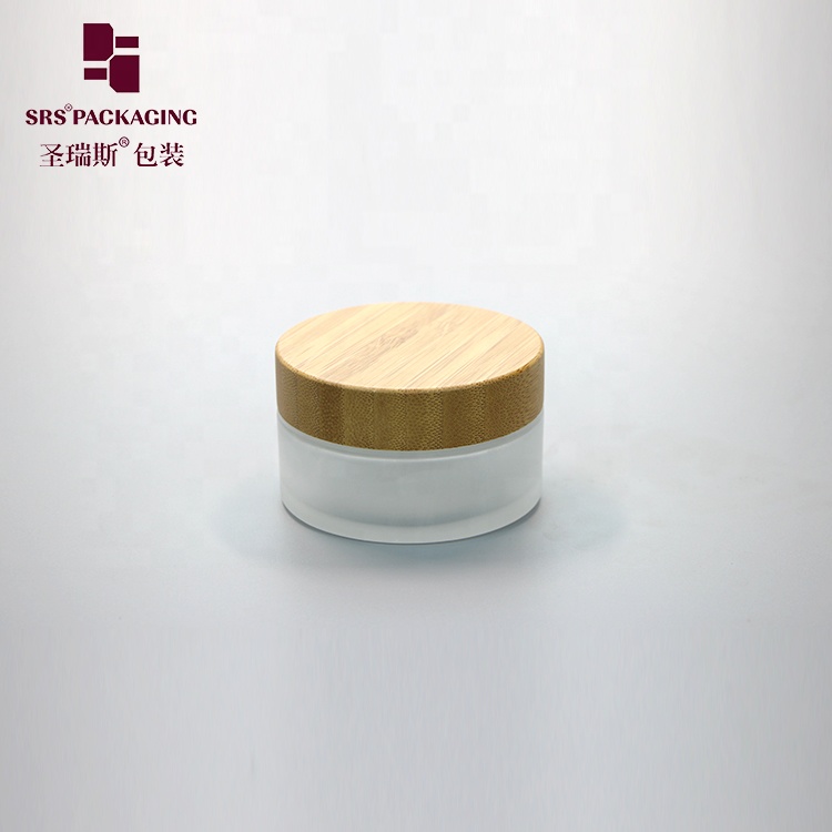 Manufacture 100g clear round straight-sided glass jars with wood lid storage