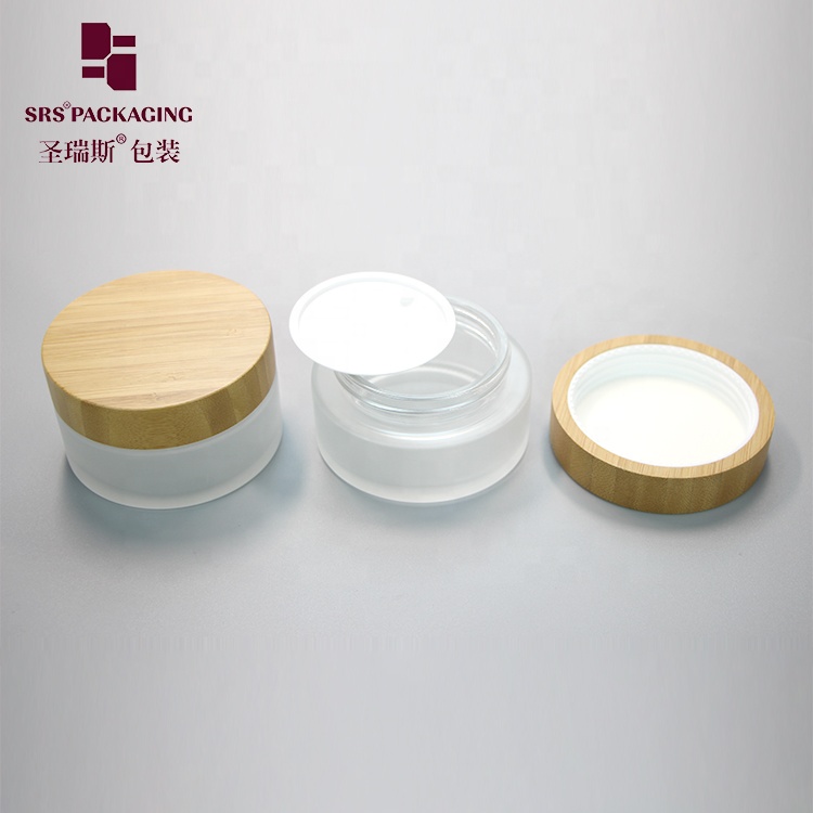 Manufacture 100g clear round straight-sided glass jars with wood lid storage