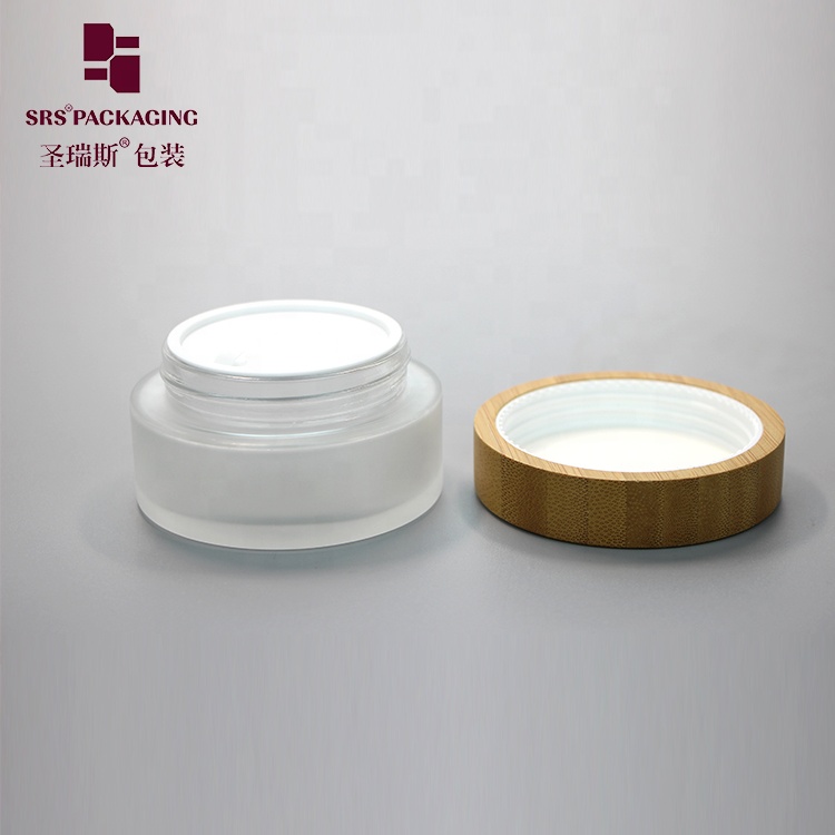 Manufacture 100g clear round straight-sided glass jars with wood lid storage