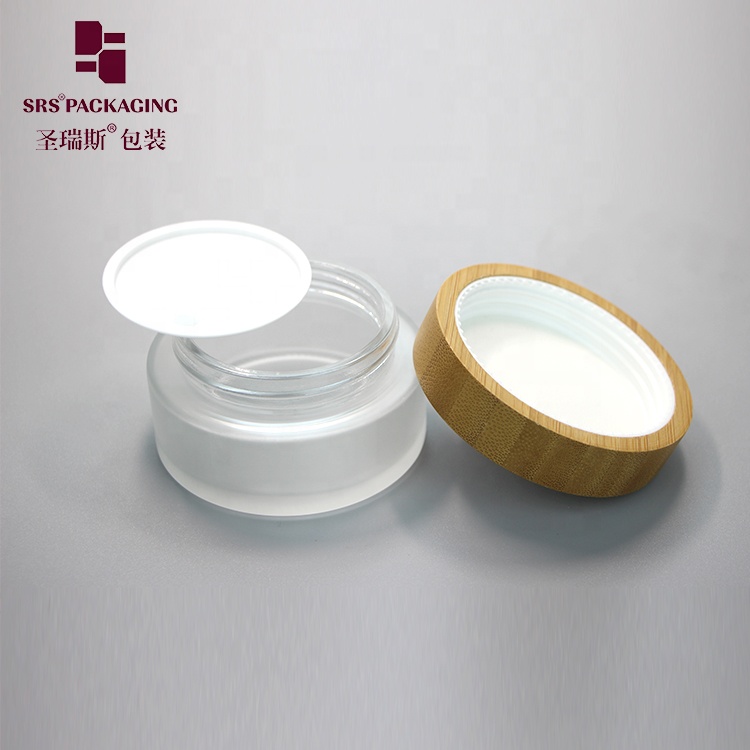 Manufacture 100g clear round straight-sided glass jars with wood lid storage