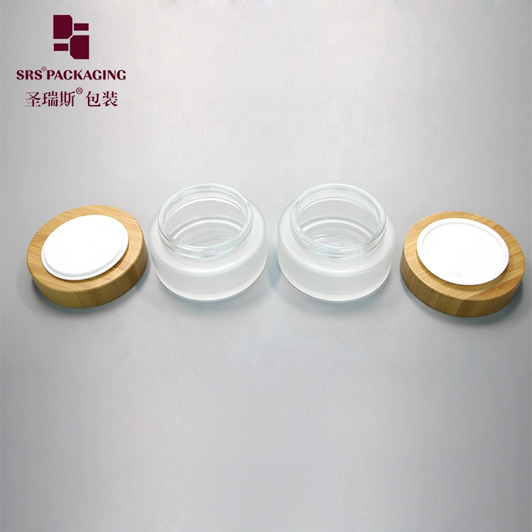 Manufacture 100g clear round straight-sided glass jars with wood lid storage