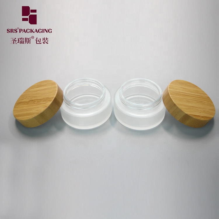 Manufacture 100g clear round straight-sided glass jars with wood lid storage