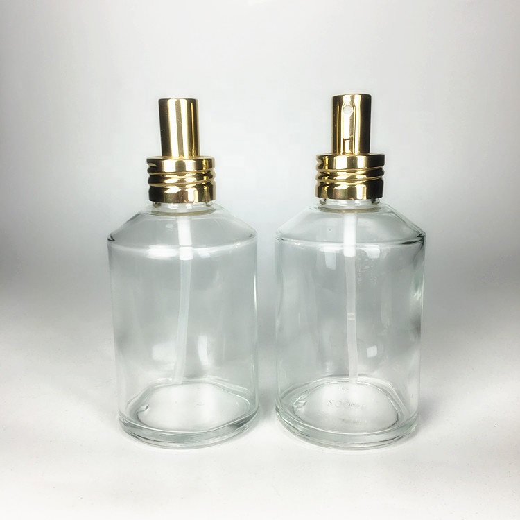 Manufacture round shape 200ml glass perfume bottle with gold sprayer lid