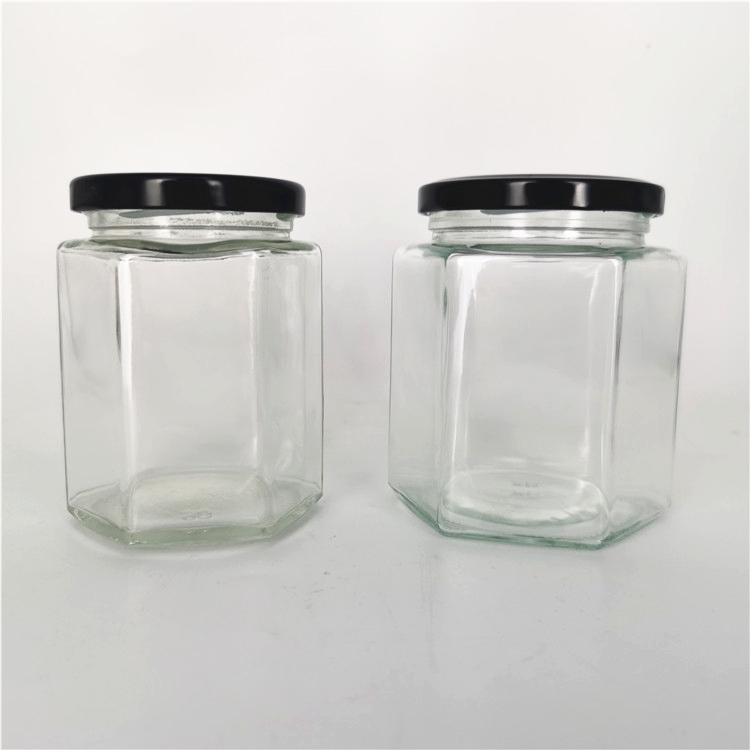 Manufacturer 180ml 280ml 380ml hexagon glass jar for grocery,oval honey jar packaging wholesale