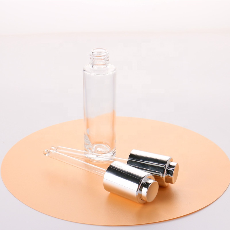 Manufacturer Direct Supply Cylinder Shape Silver Lid Pressed Pump Glass Dropper 30ml Empty Glass Serum Bottle
