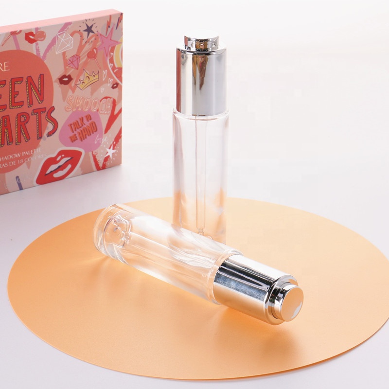 Manufacturer Direct Supply Cylinder Shape Silver Lid Pressed Pump Glass Dropper 30ml Empty Glass Serum Bottle