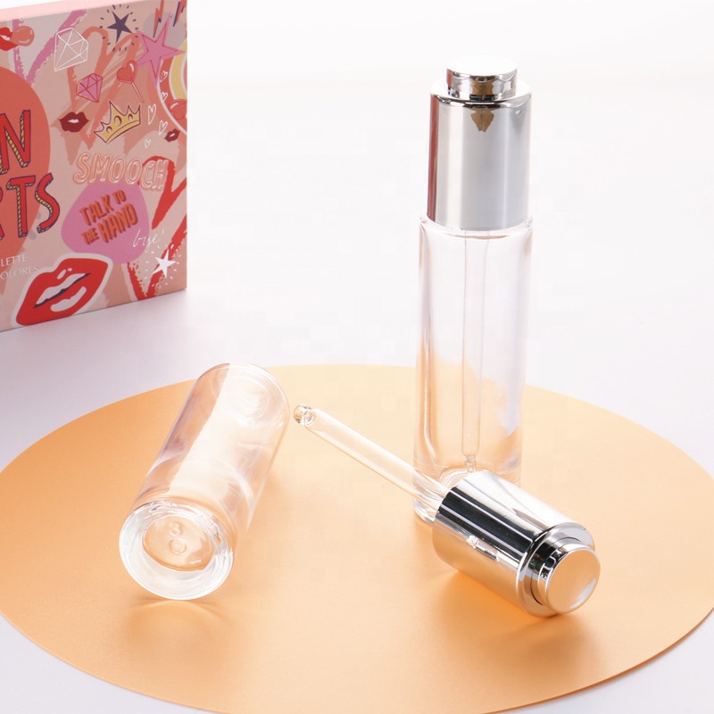Manufacturer Direct Supply Cylinder Shape Silver Lid Pressed Pump Glass Dropper 30ml Empty Glass Serum Bottle