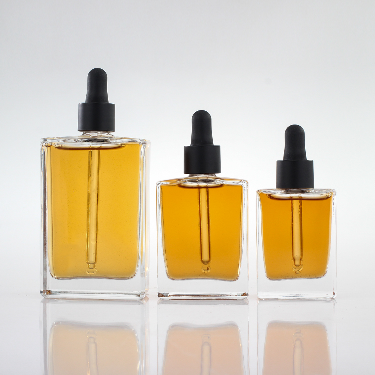 Manufacturer Free Samples Luxury Empty 30ml 50ml 100ml Square Rectangle Clear Glass Dropper Bottle With Black Lids