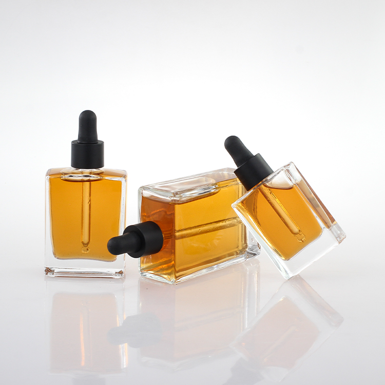 Manufacturer Free Samples Luxury Empty 30ml 50ml 100ml Square Rectangle Clear Glass Dropper Bottle With Black Lids