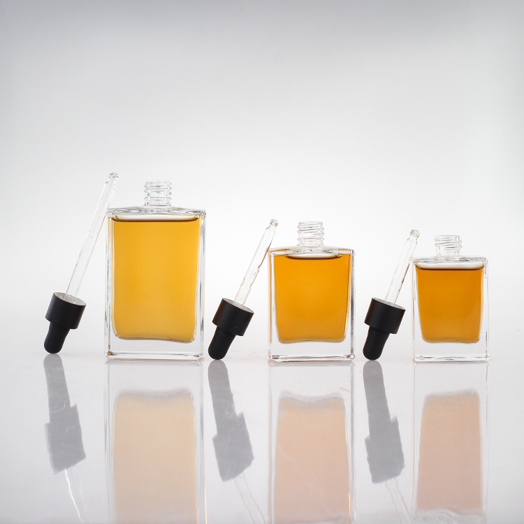 Manufacturer Free Samples Luxury Empty 30ml 50ml 100ml Square Rectangle Clear Glass Dropper Bottle With Black Lids