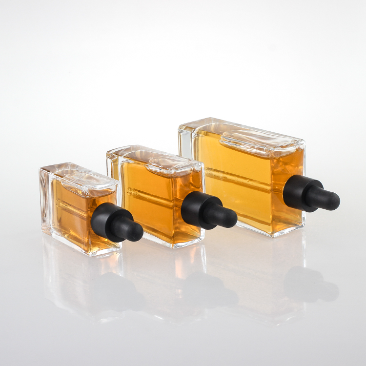 Manufacturer Free Samples Luxury Empty 30ml 50ml 100ml Square Rectangle Clear Glass Dropper Bottle With Black Lids