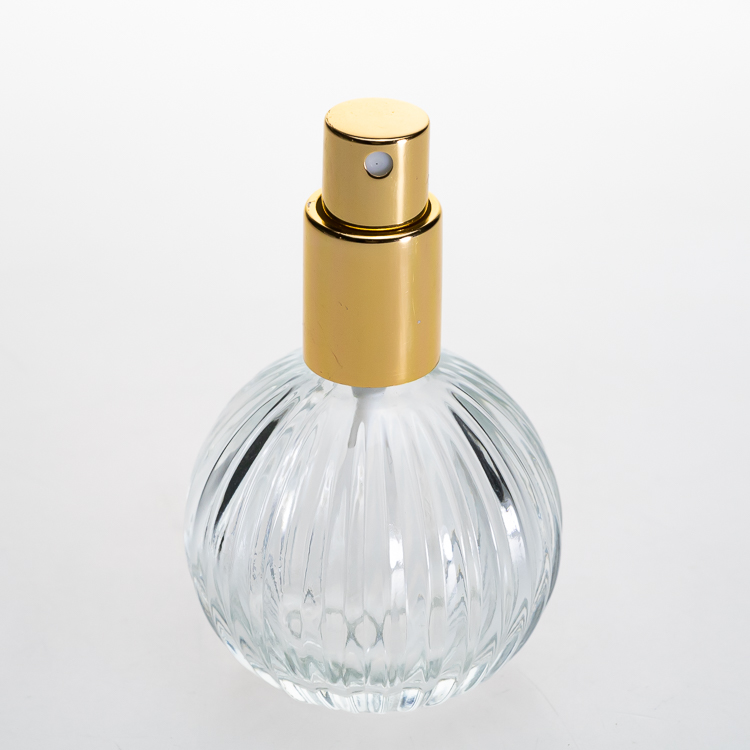 Manufacturer Perfume Bottles 50ml Round Ball Embossed Crystal Perfume Glass Bottle with Pump Spray