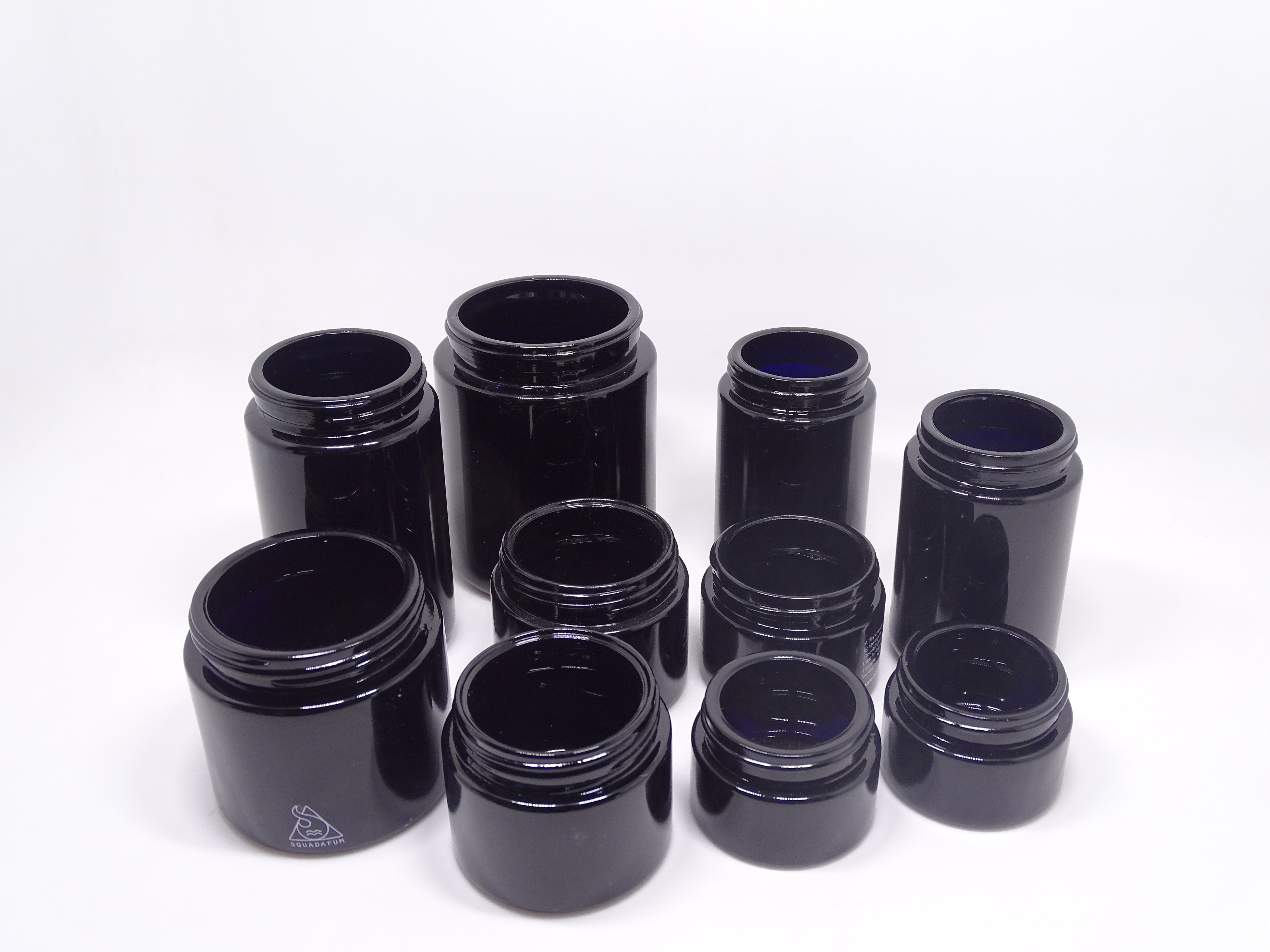 Manufacturer cosmetic packaging 2 oz 4 oz black uv glass jar for cream