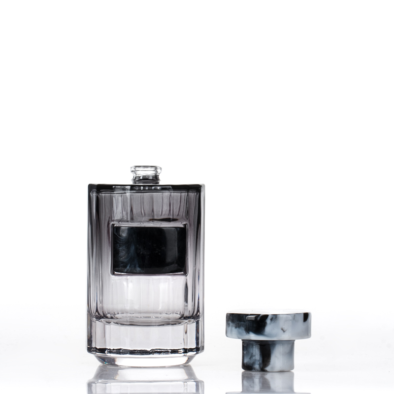 Manufacturer high quality glass bottle for perfume with marbled resin cap