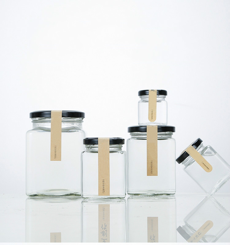 Manufacturer square glass honey bottle/jar storage jam sauce canned pickle glass jar with metal lids
