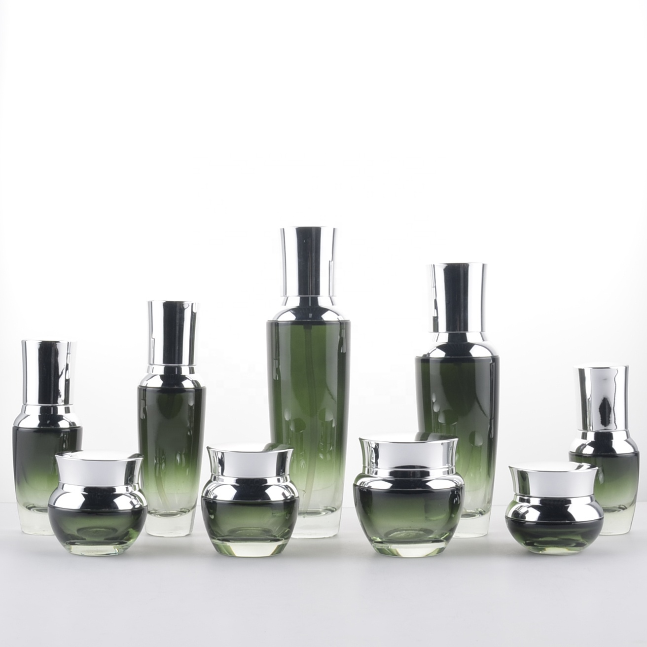 Manufacturer wholesale new dark green cosmetics glass bottles for packaging