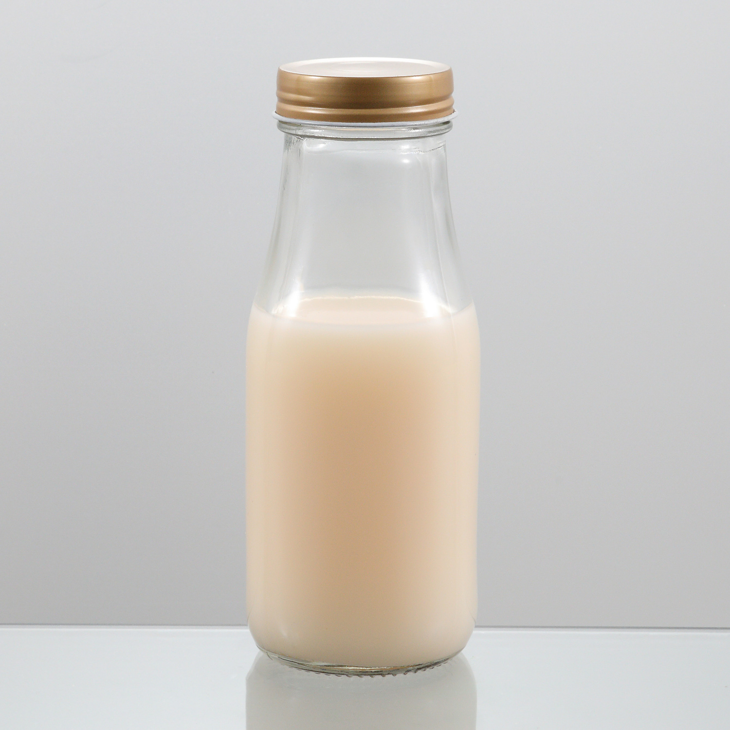 Manufacturers High Quality Beverage Customize 300ml Empty Clear Round Milk Glass Bottle