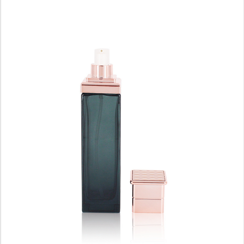 Manufacturers selling black transparent glass bottle rose gold electroplated aluminum bottle cap vacuum emulsion bottle