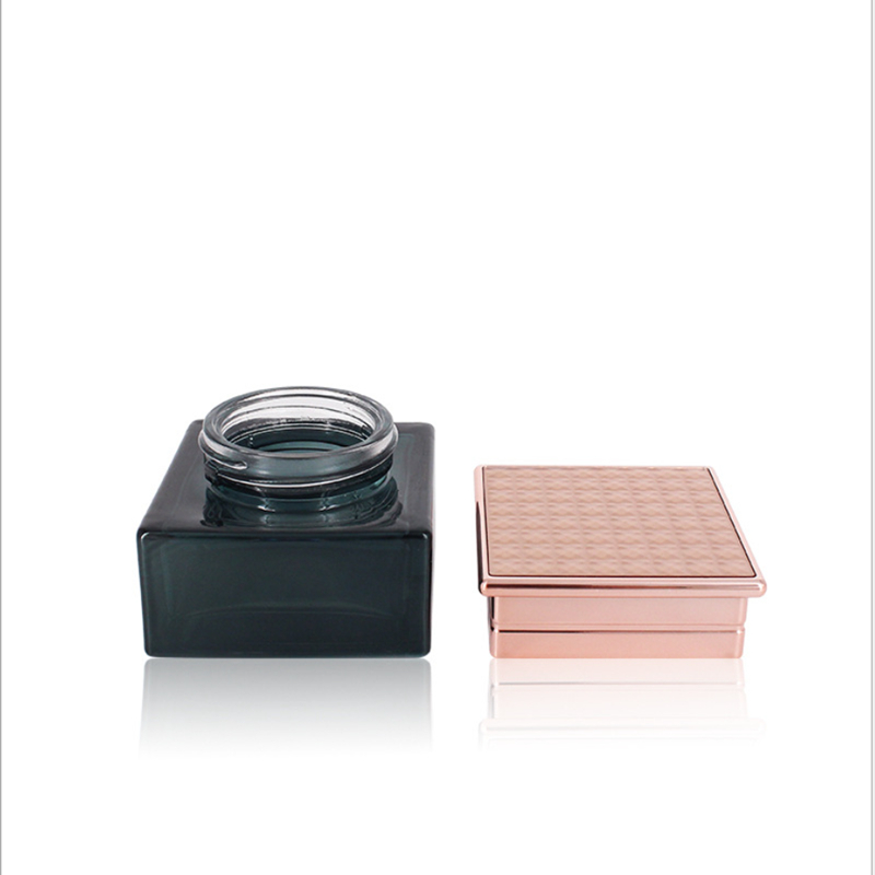 Manufacturers selling black transparent glass bottle rose gold electroplated aluminum bottle cap vacuum emulsion bottle