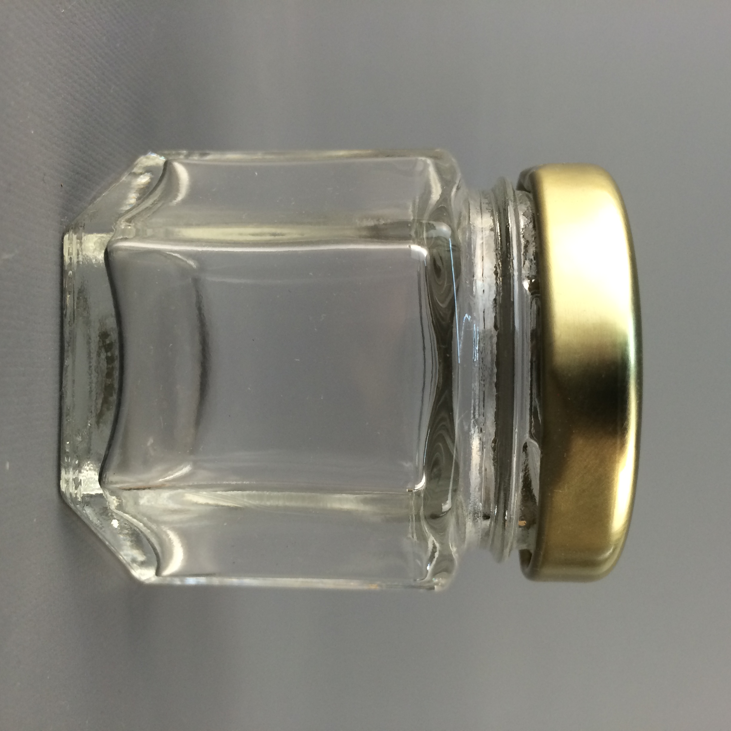 Manufacturers wholesale 45ml hexagon mini glass bottles jar glass