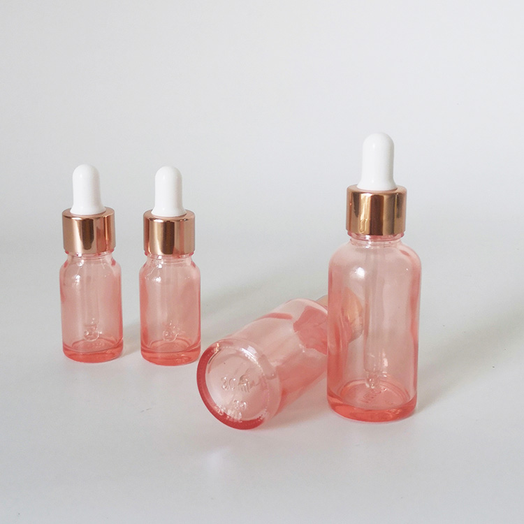 Mass stock 5ml 10ml 15ml 30ml transanparent pink glass dropper bottle with rose gold cap