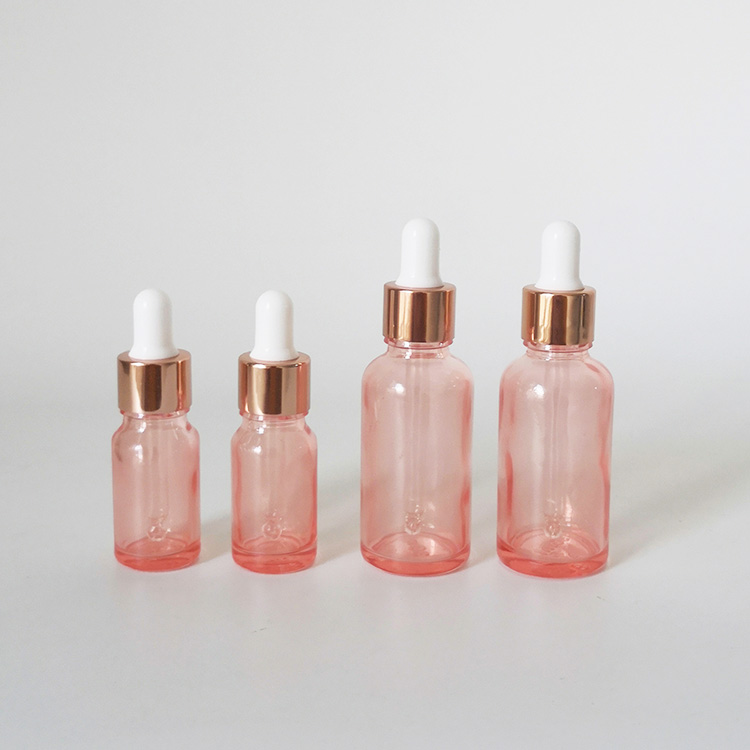 Mass stock 5ml 10ml 15ml 30ml transanparent pink glass dropper bottle with rose gold cap