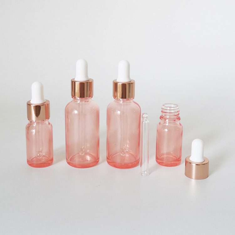 Mass stock 5ml 10ml 15ml 30ml transanparent pink glass dropper bottle with rose gold cap