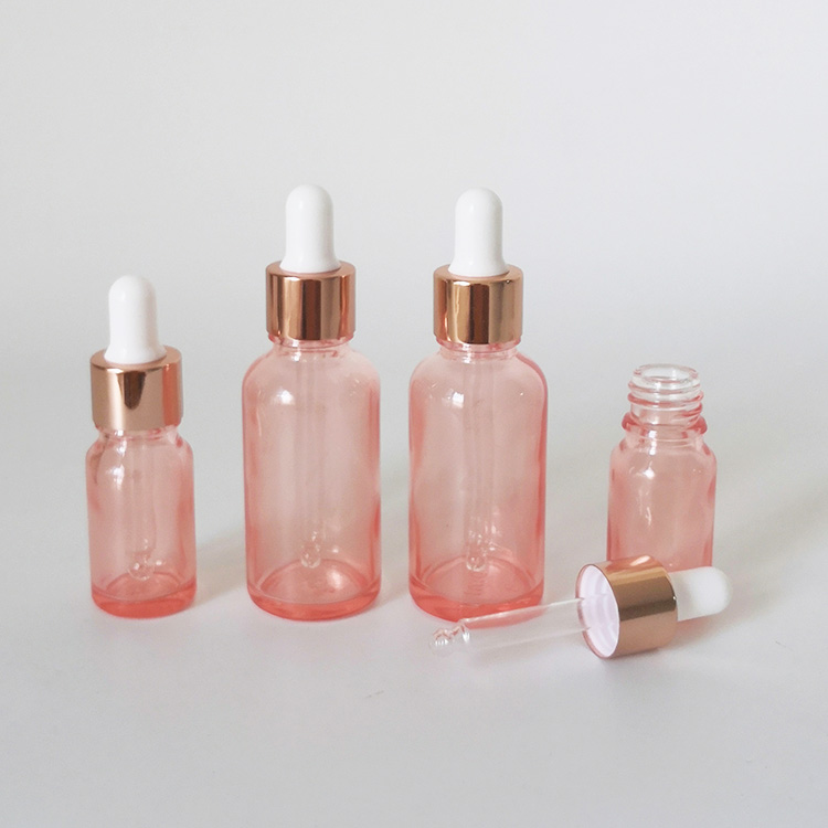 Mass stock 5ml 10ml 15ml 30ml transanparent pink glass dropper bottle with rose gold cap