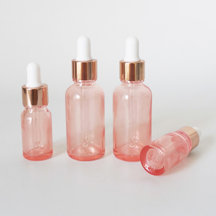 Mass stock 5ml 10ml 15ml 30ml transanparent pink glass dropper bottle with rose gold cap