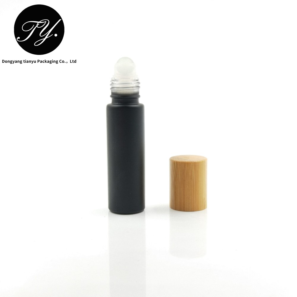 Matt black 10ml glass roll on bottle with custom bamboo cap