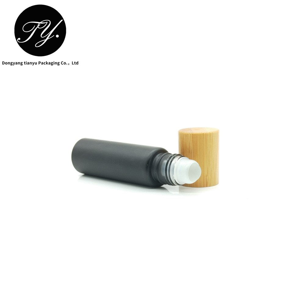 Matt black 10ml glass roll on bottle with custom bamboo cap