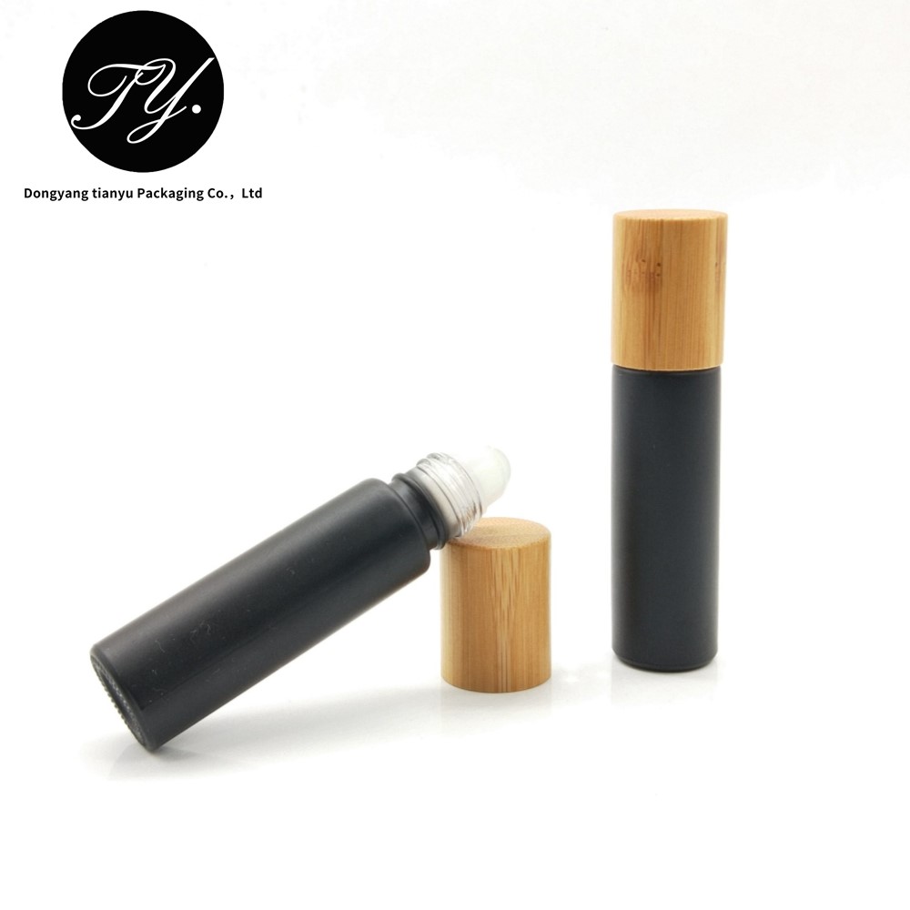 Matt black 10ml glass roll on bottle with custom bamboo cap