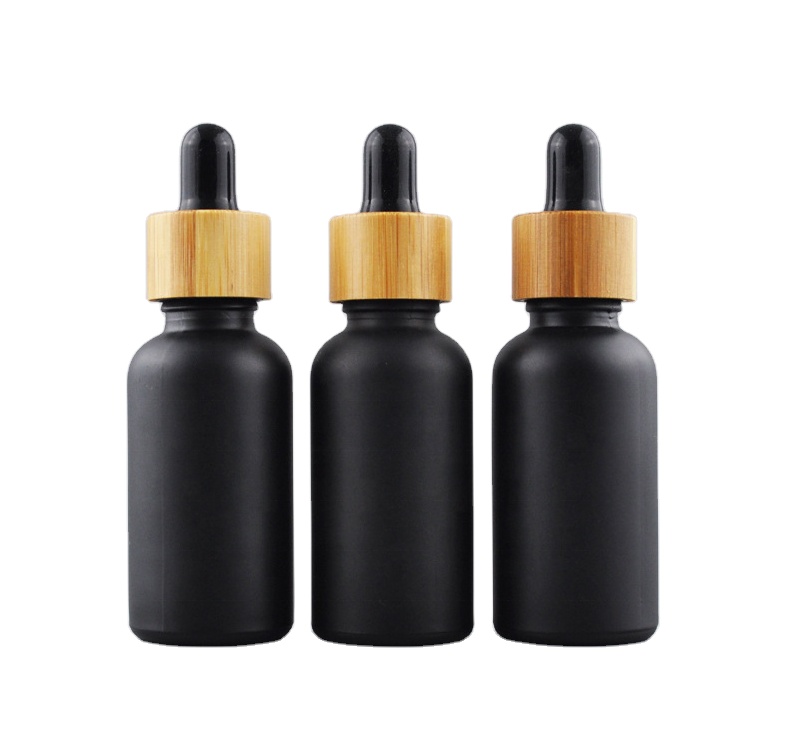 Matt black essential oil bottle with bamboo dropper