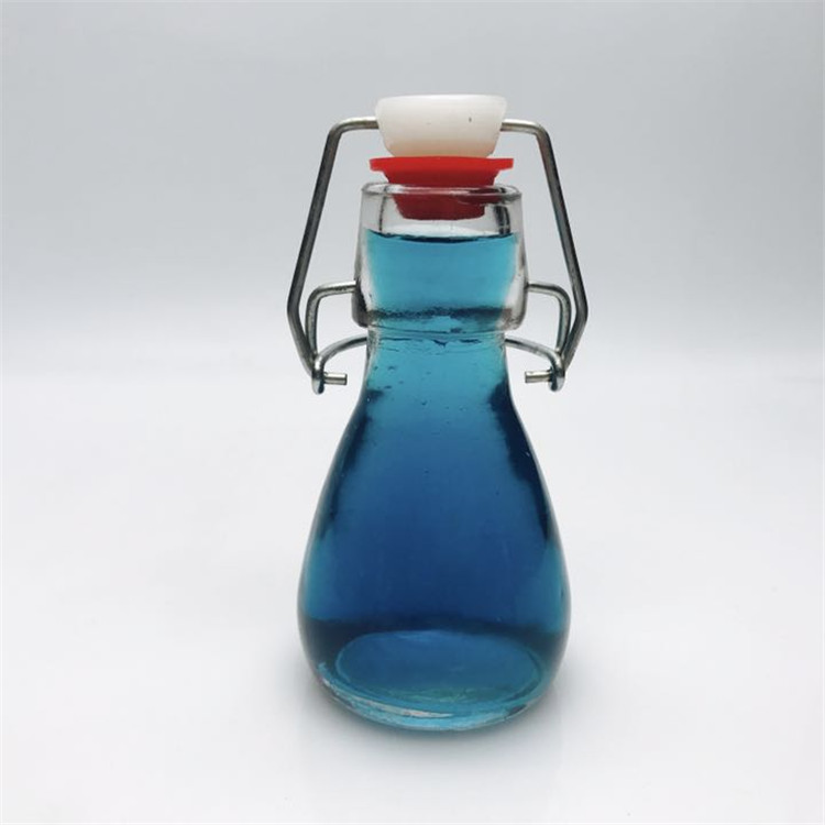Mini 50ml 2oz swing top glass bottle for candy beverage