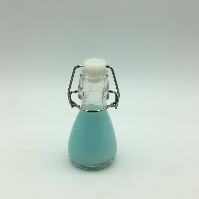 Mini 50ml 2oz swing top glass bottle for candy beverage
