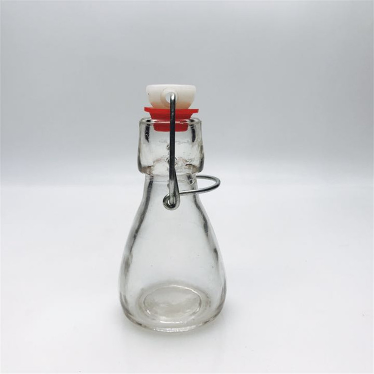 Mini 50ml 2oz swing top glass bottle for candy beverage