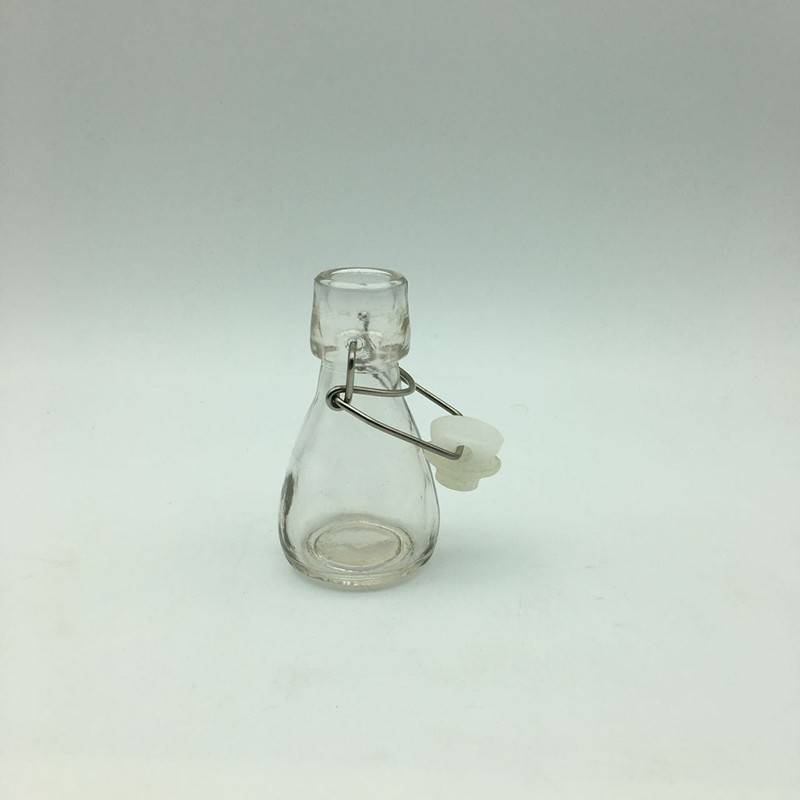 Mini 50ml 2oz swing top glass bottle for candy beverage