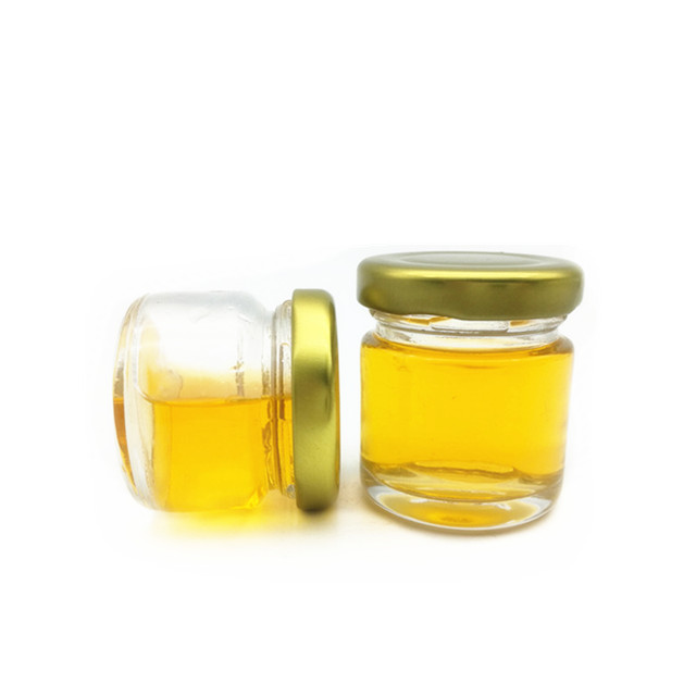 Mini glass jar 25ml 35ml round clear honey jam glass jar with metal lid wholesale