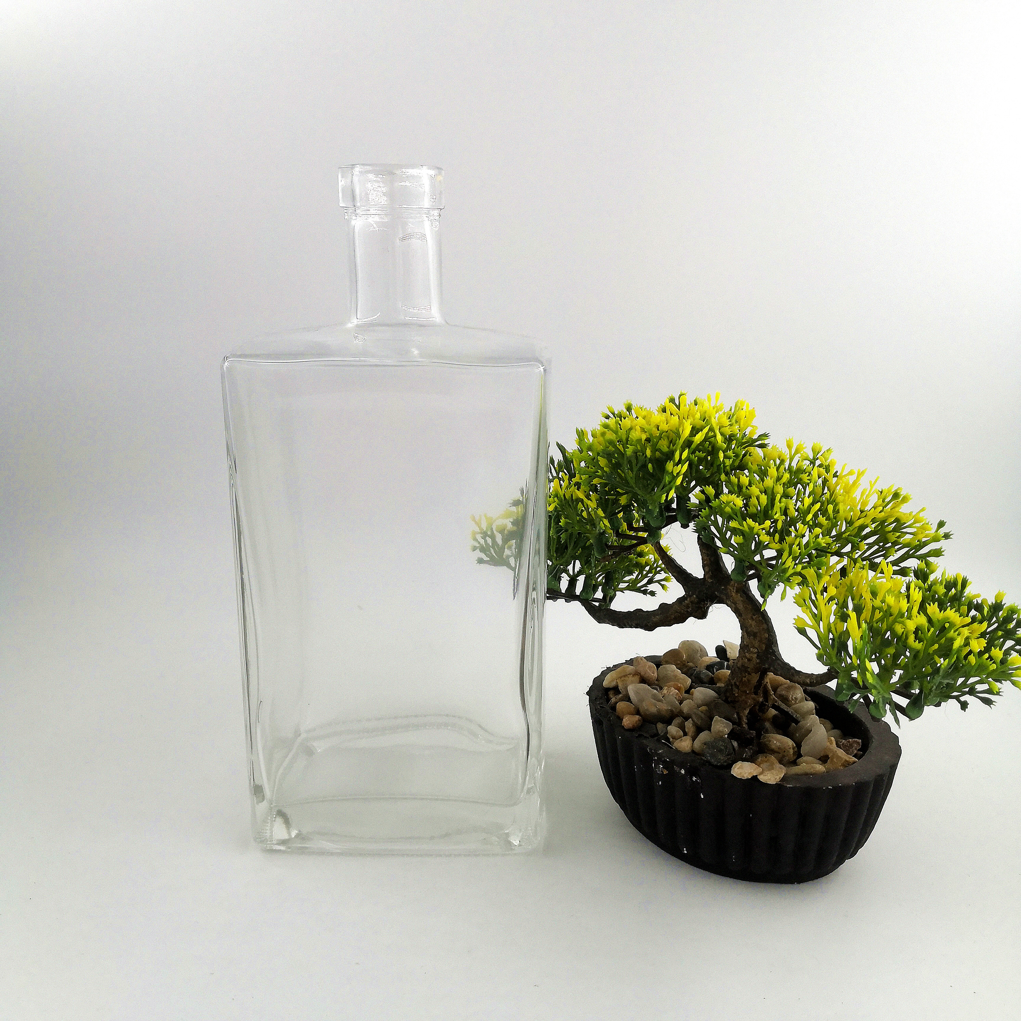 Mini liquor whisky pet glass bottle with metal screw cap wholesale price custom 30ml 50ml 100ml spirit bottle