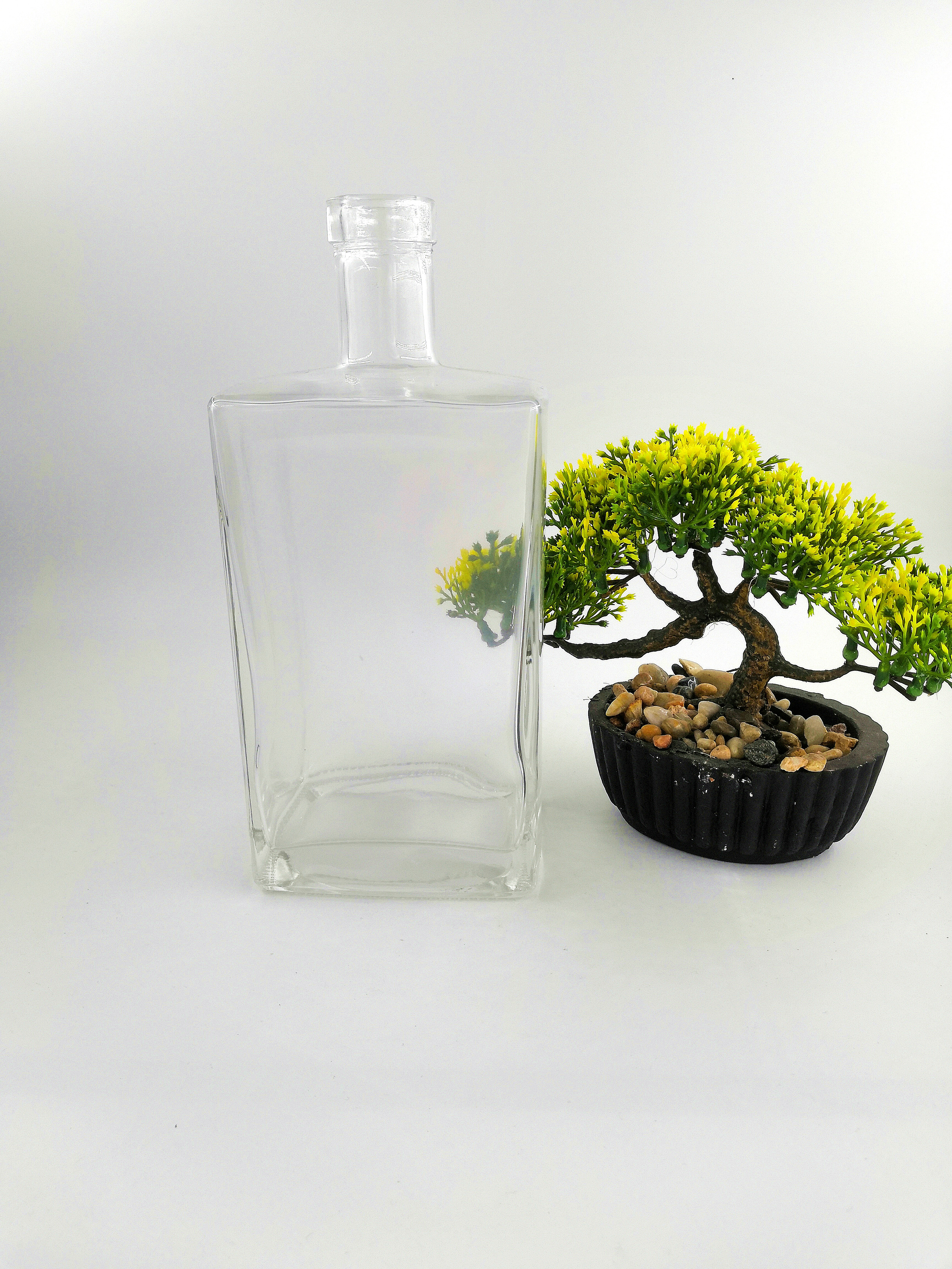 Mini liquor whisky pet glass bottle with metal screw cap wholesale price custom 30ml 50ml 100ml spirit bottle