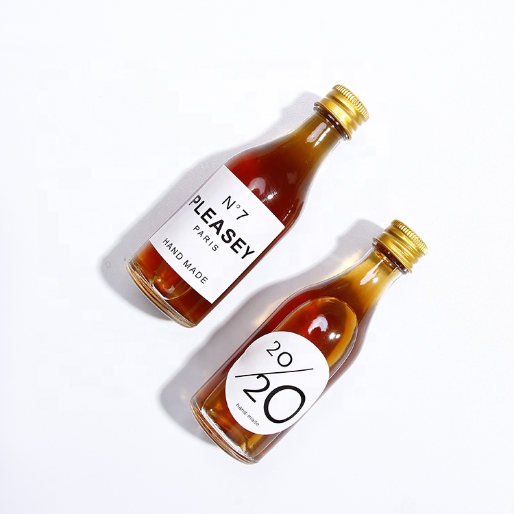 Mocale China Cheap Price 50ml Glass Bitter Bottle Mini Spirits Bottle With Gold Cap