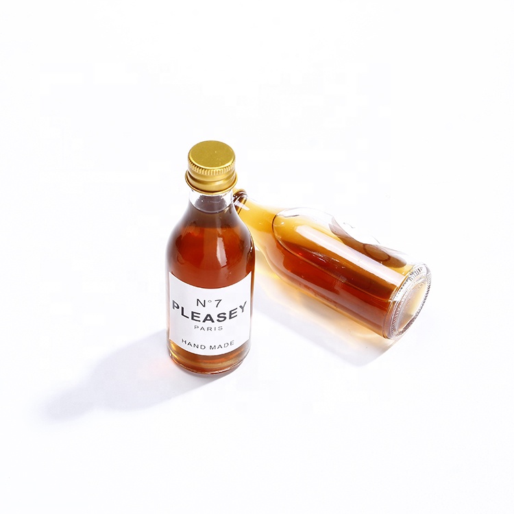 Mocale China Cheap Price 50ml Glass Bitter Bottle Mini Spirits Bottle With Gold Cap