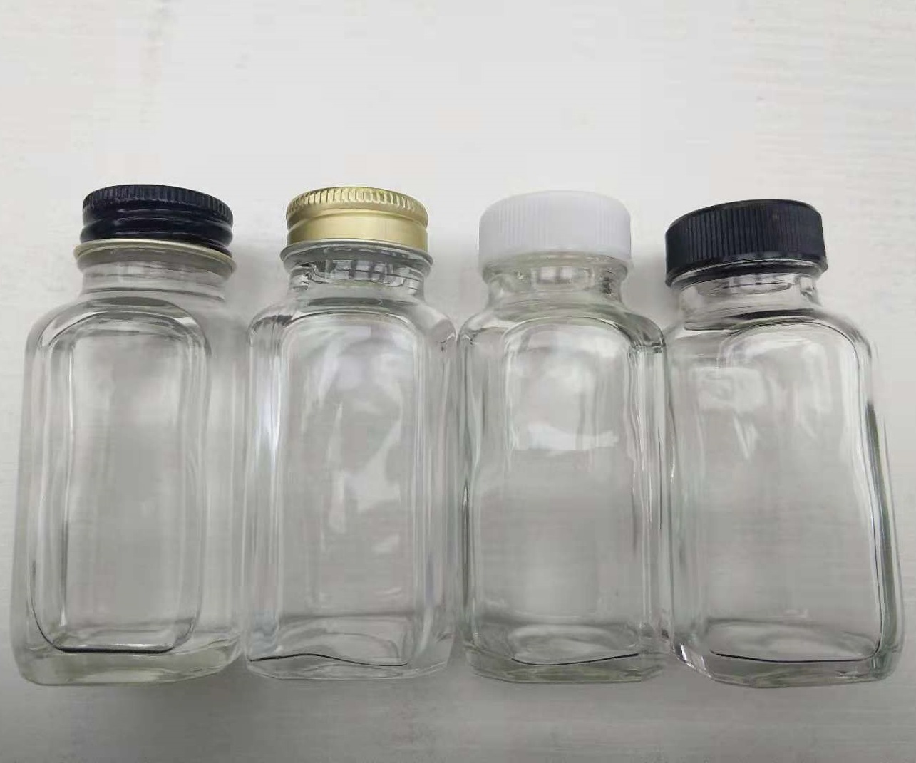 Mocale RTS in stock buy glass bottle screen printing custom small mini 120ml 2 oz glass juice jars bottles with screw lids