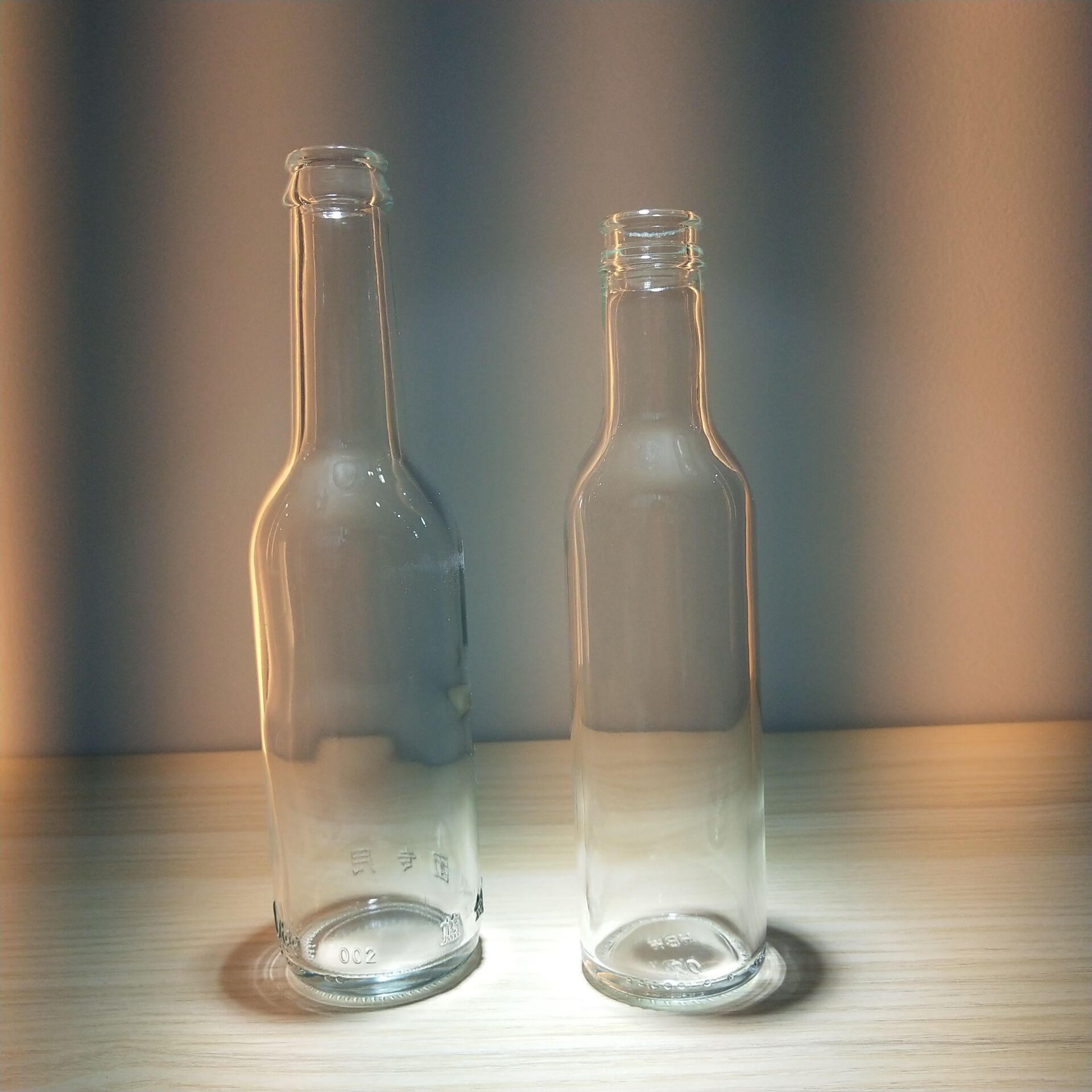 NNPB Mass Production 250ml Transparent Glass Beer Beverage Sparkling Wine Bottle