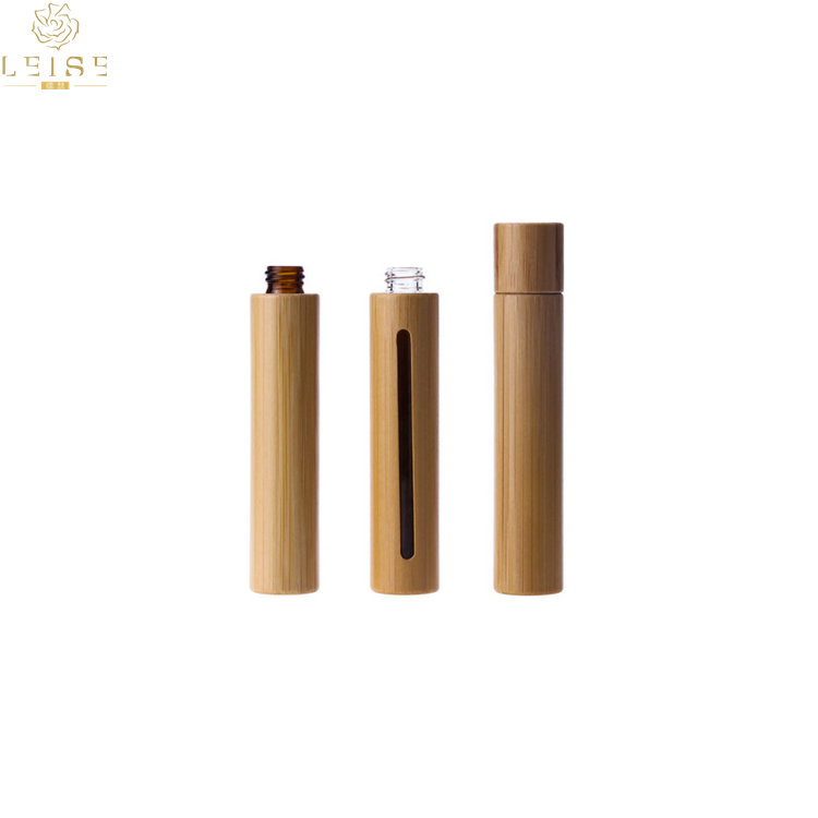 Natural 5ml 10ml 15ml bamboo roll on bottle cosmetic oil real bamboo glass roller bottle with bamboo cap metal roller ball