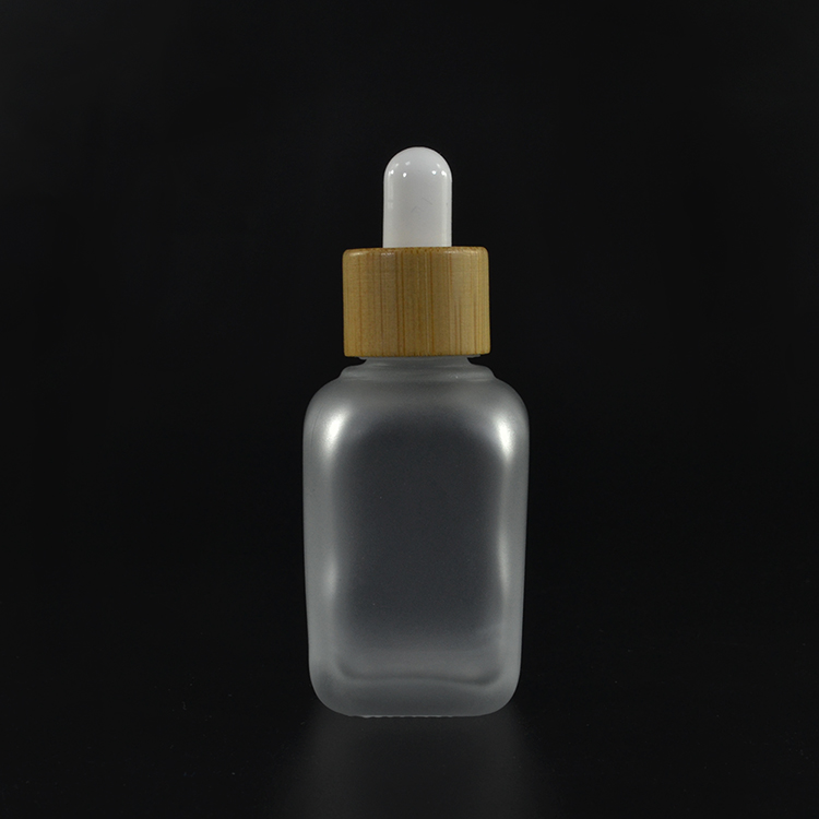 Natural bamboo cap package cylinder square rectangular 30ml 50ml 100ml glass essential oil bottle with dropper