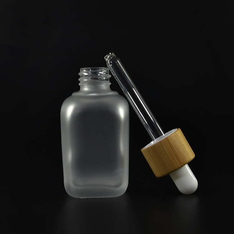 Natural bamboo cap package cylinder square rectangular 30ml 50ml 100ml glass essential oil bottle with dropper