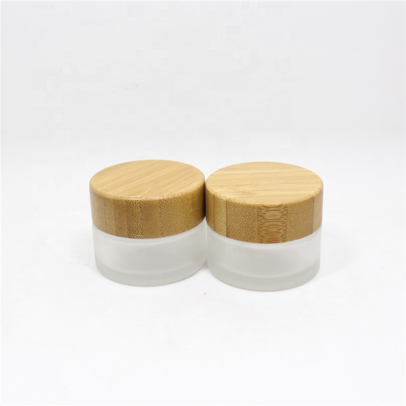 Natural products 30g 50g 100g clear bamboo lid small glass jars for cosmetic packaging with screw lid