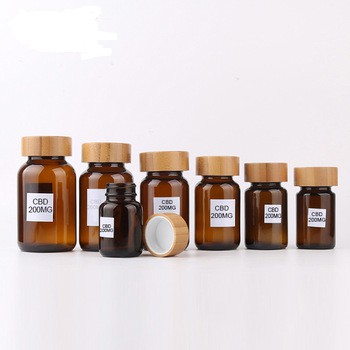 New Arrived Amber Cbd E Liquid Bottle Amber Glass Bottle with Bamboo Lid Child Proof Cap