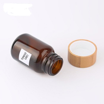 New Arrived Amber Cbd E Liquid Bottle Amber Glass Bottle with Bamboo Lid Child Proof Cap